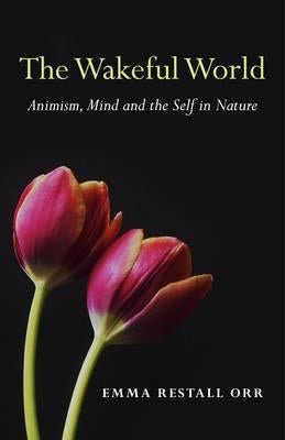 Paperback copy of The Wakeful World by Moon Books, exploring animism, mind, and self in nature with a contemplative cover design.