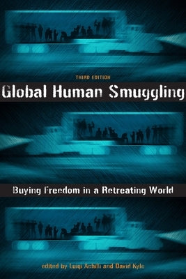 Global Human Smuggling: Buying Freedom in a Retreating World Paperback Johns Hopkins University Press