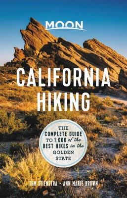 Paperback guidebook titled "Moon California Hiking" by Moon Travel, featuring a scenic mountain trail on the cover.