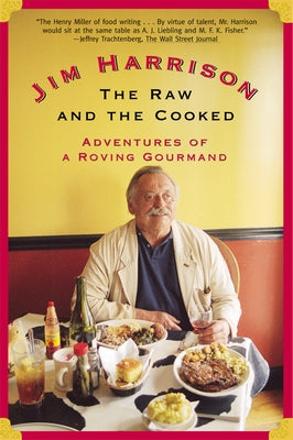 Paperback of "The Raw and the Cooked" by Grove Press featuring a cover with colorful culinary illustrations.