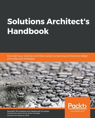 Paperback Solutions Architect's Handbook by Packt Publishing with detailed diagrams and text on cloud architecture and design principles.
