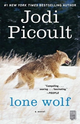 Paperback of Lone Wolf by Atria Books, featuring the book cover with bold title and wolf imagery on the front.