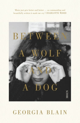 Between a Wolf and a Dog Paperback Scribe Us