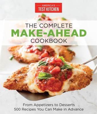 The Complete Make-Ahead Cookbook by America's Test Kitchen showing a spread of prepared appetizers, main dishes, and desserts on a table.