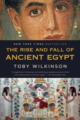 Paperback copy of The Rise and Fall of Ancient Egypt by Random House Trade, featuring the book's front cover with historical imagery.