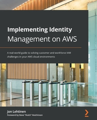 Paperback book titled "Implementing Identity Management on AWS" by Packt Publishing, with cover image featuring the book's title and design.