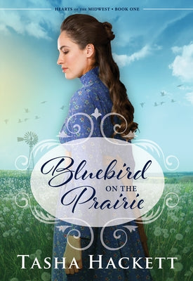 Paperback book titled "Bluebird on the Prairie: Hearts of the Midwest" by Electric Moon Publishing, featuring a prairie scene on the cover.