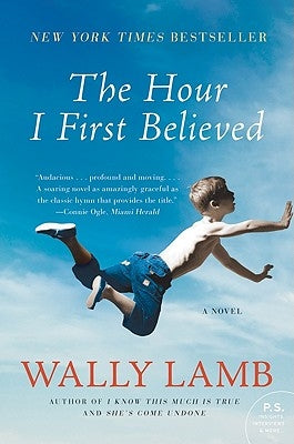 Paperback copy of "The Hour I First Believed" by Harper Perennial, featuring the book's cover with title and author details.