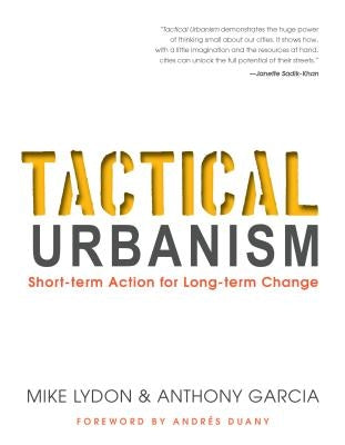 Paperback of "Tactical Urbanism" book by Island Press showing the front cover with urban planning illustrations.