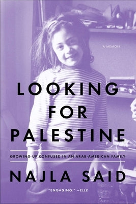 Paperback copy of "Looking for Palestine" by Riverhead Books showing the front cover with title and author details.