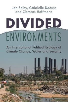 Paperback book titled "Divided Environments" by Cambridge University Press, focusing on political ecology, climate change, water, and security.