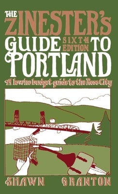 Paperback copy of Zinester's Guide to Portland by Microcosm Publishing, featuring colorful cover art about low/no budget city tips.
