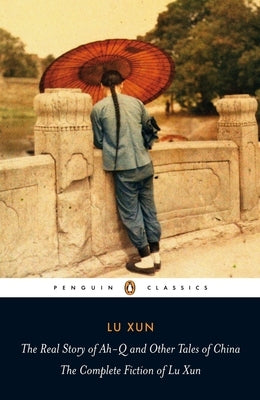 Paperback of "The Real Story of Ah-Q and Other Tales of China" by Lu Xun, published by Penguin Group, showing the book cover.