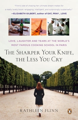Paperback copy of "The Sharper Your Knife, the Less You Cry" by Penguin Books featuring a colorful cover with Parisian culinary scenes.