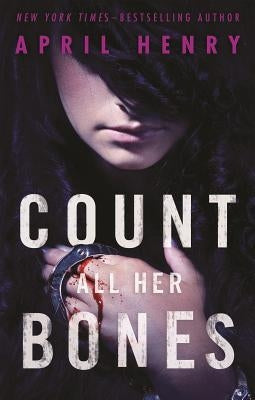 Paperback of "Count All Her Bones" by Square Fish, featuring the book cover with dark, eerie artwork and title text.