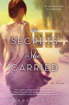 Paperback of The Secrets She Carried by Berkley/Nal, showing the book cover with title and author details.
