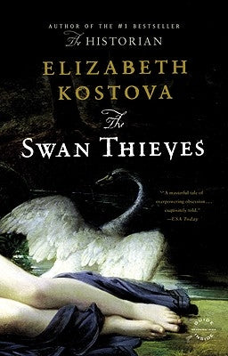 A paperback copy of The Swan Thieves by Back Bay Books with a colorful cover featuring artistic illustrations.