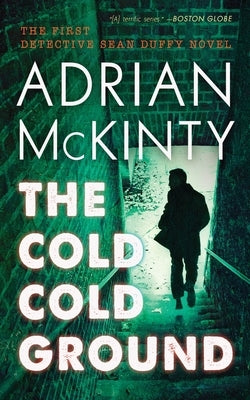 Paperback of "The Cold Cold Ground" by Blackstone Publishing, showing the book cover with dark and moody artwork.