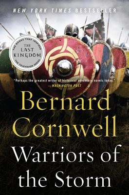 Paperback copy of Warriors of the Storm by Harper Paperbacks, featuring the book cover with fantasy artwork.