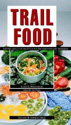 Paperback book titled "Trail Food: Drying and Cooking Food for Backpacking and Paddling" by International Marine Publishing.