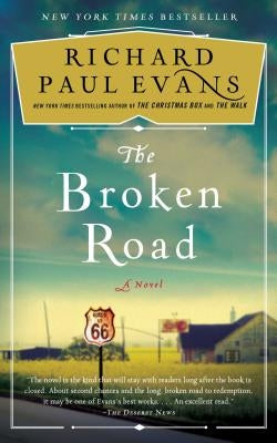 Paperback of "The Broken Road: A Novel" by Simon & Schuster, showing the book cover with title and author details.