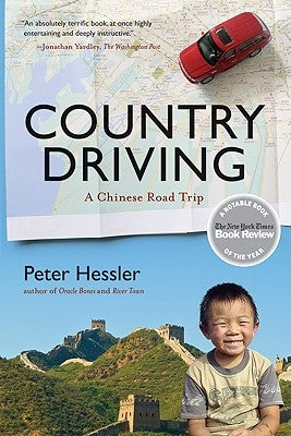 Paperback copy of "Country Driving: A Chinese Road Trip" by Harper Perennial, showing the book cover with Chinese scenery artwork.