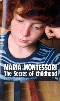 Paperback copy of "The Secret of Childhood" by Ballantine Books, featuring the book's cover with title and author details.