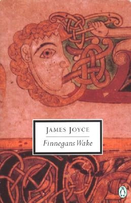 Paperback copy of "Finnegans Wake" by James Joyce, published by Penguin Group, showing the book's cover with title and author.