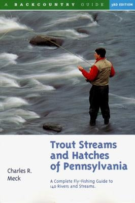 Paperback book titled "Trout Streams and Hatches of Pennsylvania" by Countryman Press, featuring cover with trout and stream illustrations.
