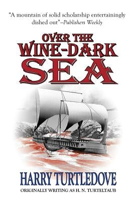 Paperback of "Over the Wine-Dark Sea" by Phoenix Pick, showing the book cover with navy and gold design elements.