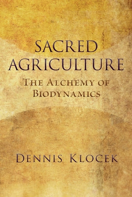 Paperback book titled "Sacred Agriculture: The Alchemy of Biodynamics" by Lindisfarne Books, with green cover and botanical illustrations.