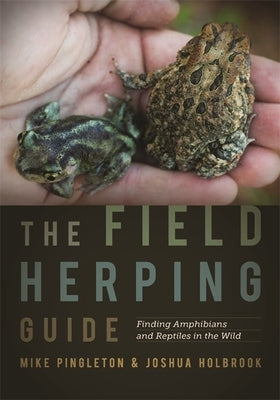 Open page of The Field Herping Guide book by University of Georgia Press showing colorful amphibians and reptiles in their natural habitat.