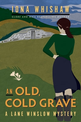 Paperback copy of "An Old, Cold Grave" novel by Touchwood Editions, featuring a dark, atmospheric cover image.