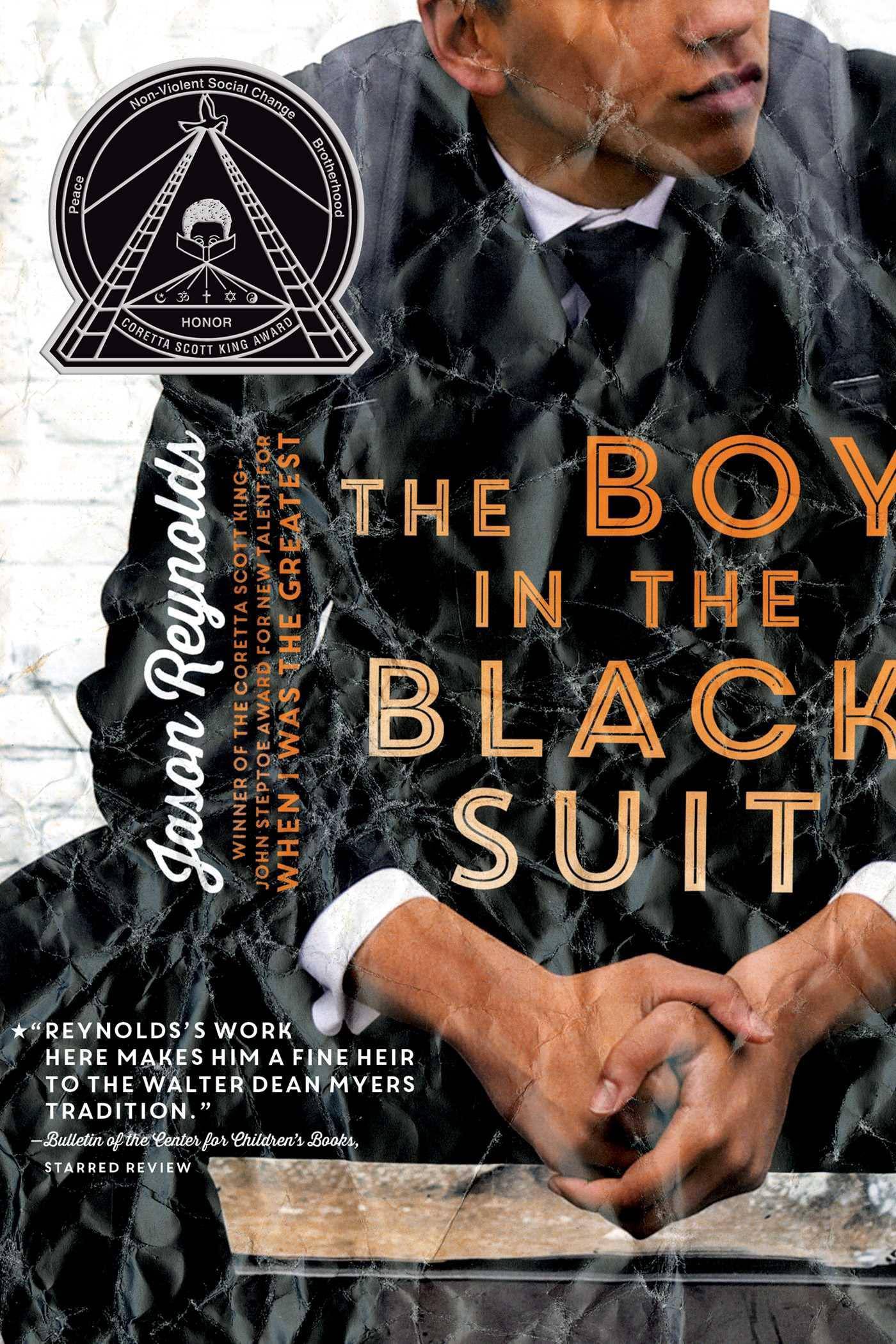 The Boy in the Black Suit - SureShot Books Publishing LLC