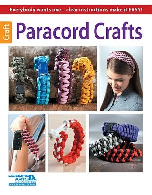 Paperback Leisure Arts Paracord Crafts book showing colorful paracord projects and detailed instructions on the cover.