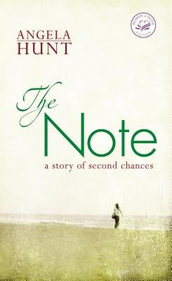Paperback copy of The Note by Thomas Nelson featuring a minimalist cover design with handwritten notes and a pen.