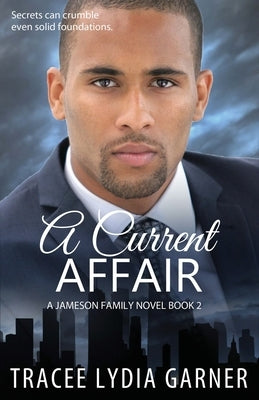 Paperback copy of A Current Affair by Tracee L. Garner, showing the book cover with title and author's name.