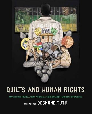 Paperback book titled "Quilts and Human Rights" by University of Nebraska Press, featuring a cover image with quilt patterns.